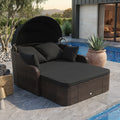 Outdoor Rattan Daybed with Retractable Canopy and Cushions