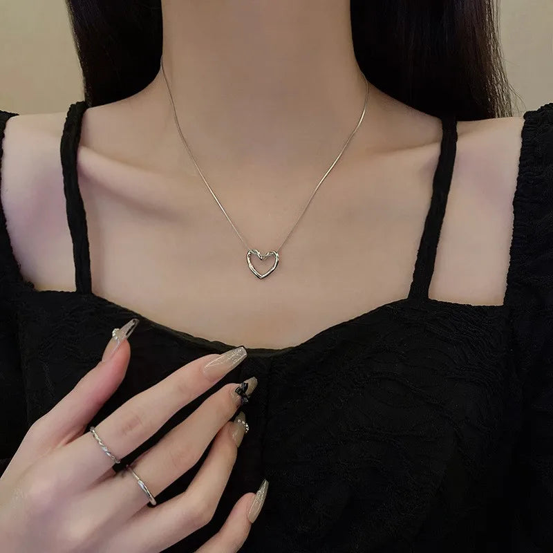 ANENJERY Stainless Steel Twist Hollow Heart Pendant Necklace | Trendy Clavicle Chain for Women