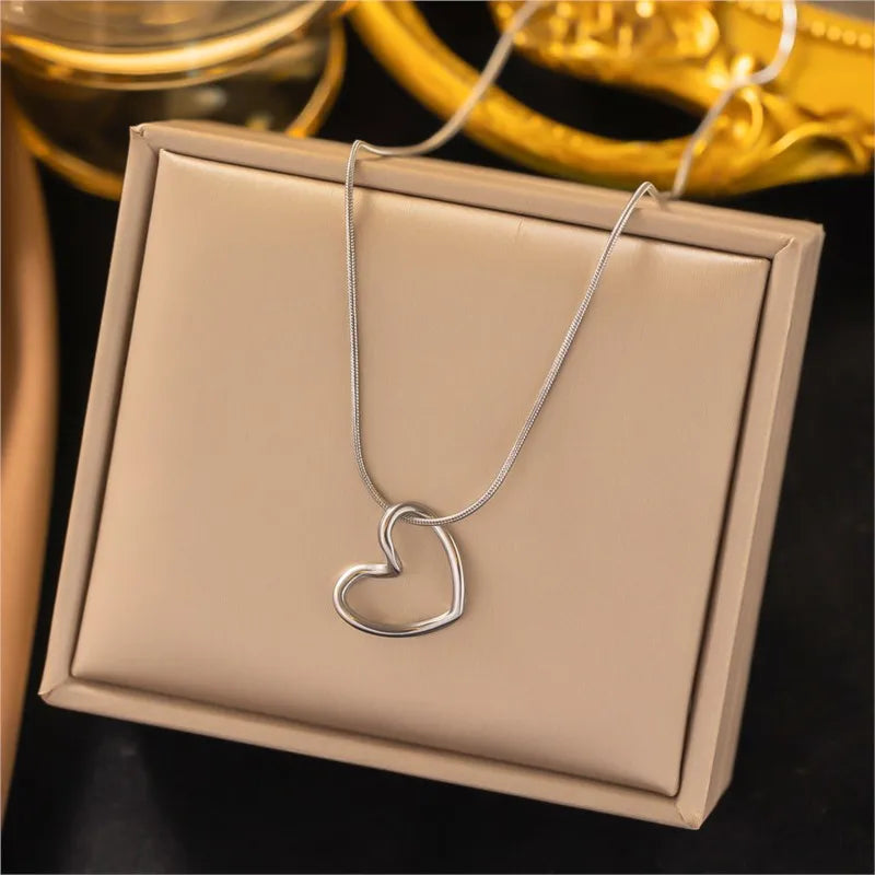 ANENJERY Stainless Steel Twist Hollow Heart Pendant Necklace | Trendy Clavicle Chain for Women