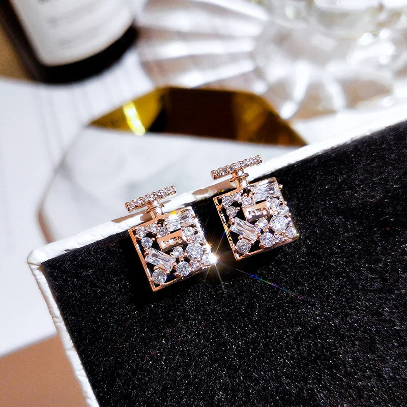 Perfume Bottle Stud Earrings | Sterling Silver Dazzling Zirconia Jewelry