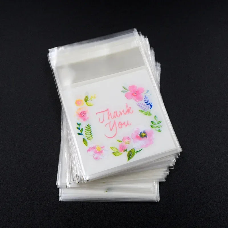 Self-Adhesive Clear Plastic Gift Bags with Thank You Print | 100 Pack Party Favor Bags